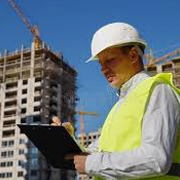 Man in yellow vest and hard hat