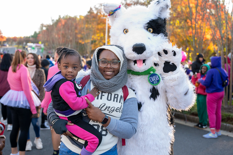 SCC mascot Chaser with family