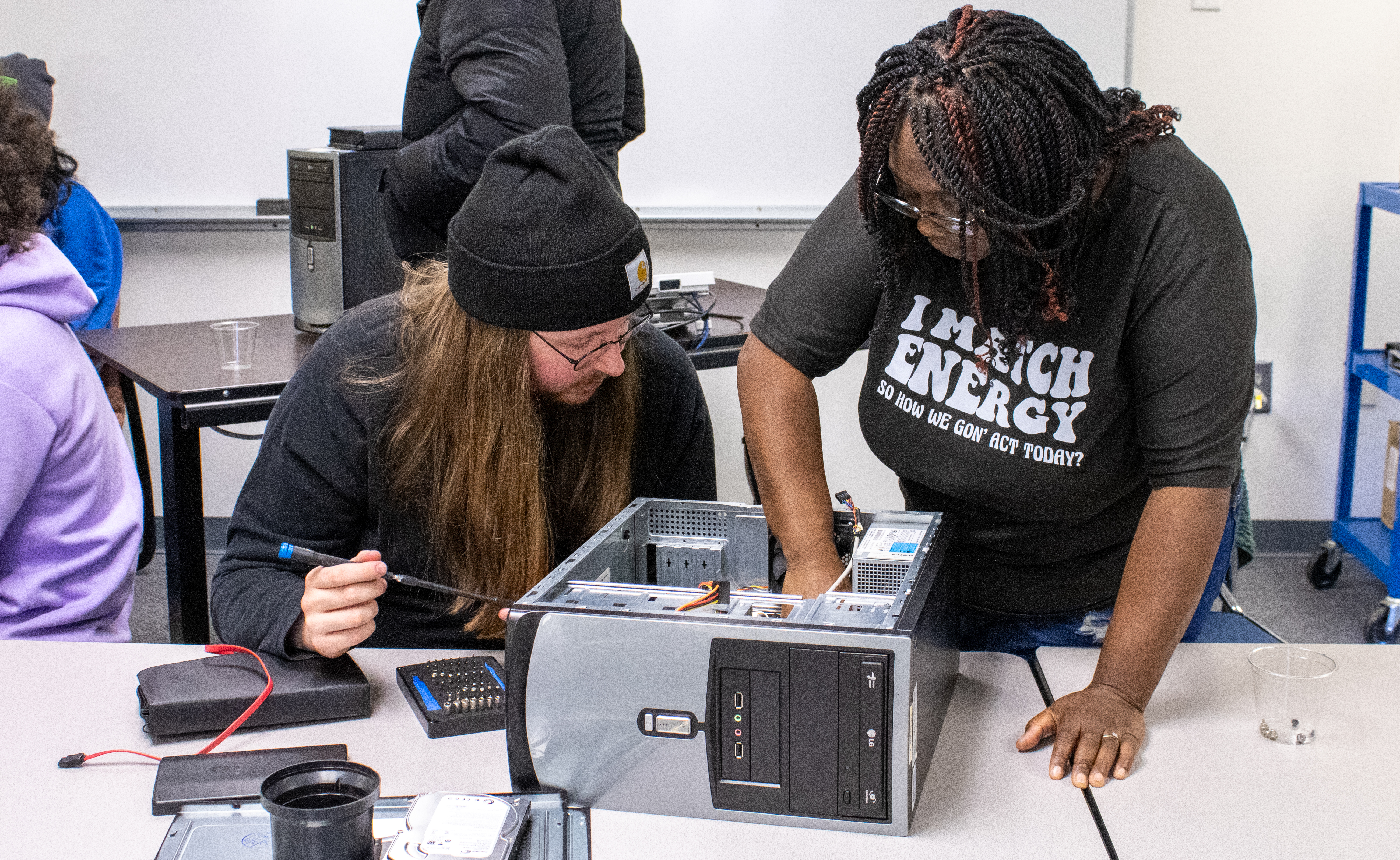 Students at SCC work on the internal aspects of a PC