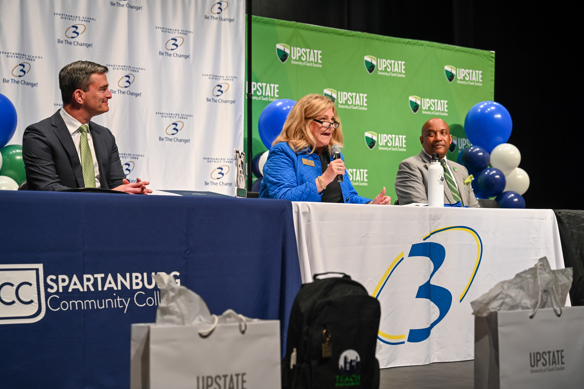 Leaders from SCC, USCU, and SSD3 sit together at a panel.